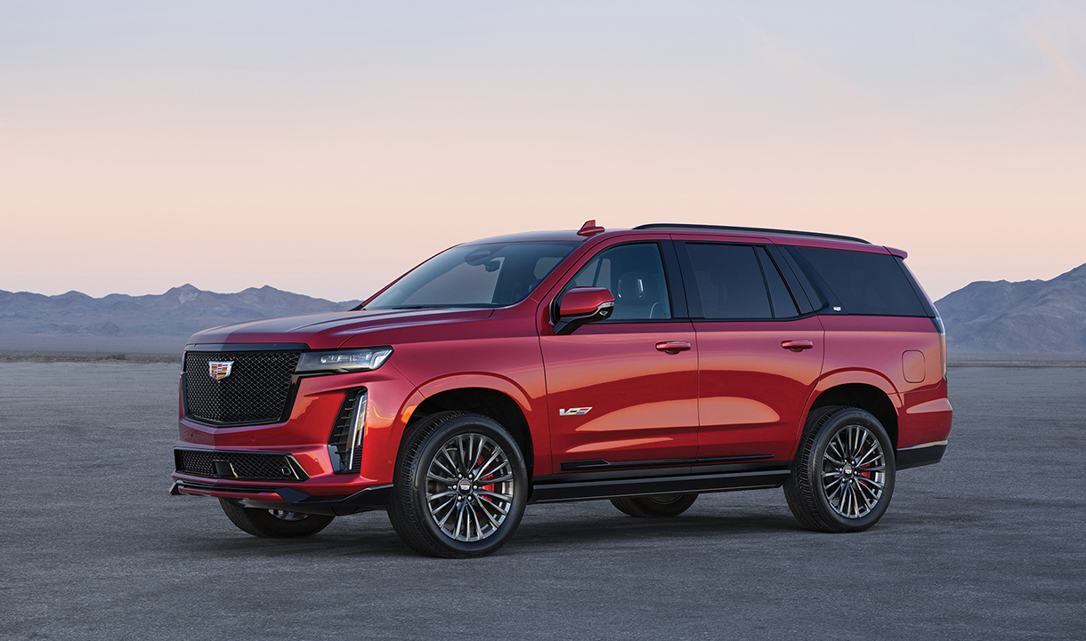 2023 Cadillac Escalade SUV parked in front of mountains